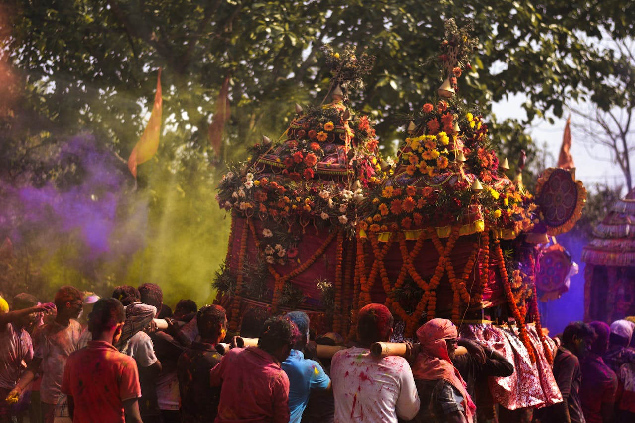 A colorful festival with people in the background